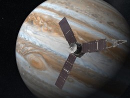 illustration of a three-armed spacecraft in front of Jupiter