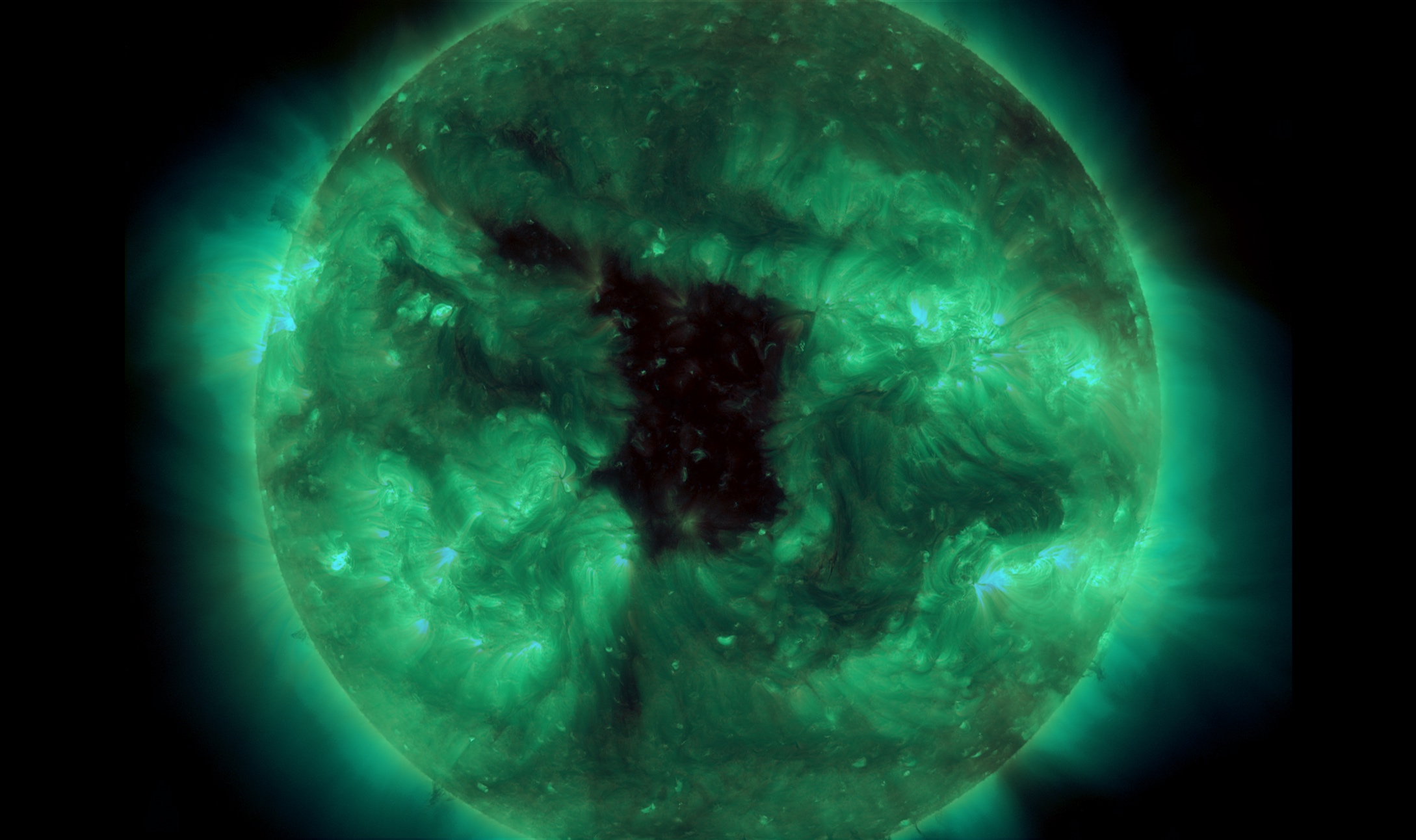 Monitoring Holes in the Sun’s Corona