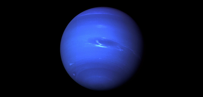 Photograph of a blue planet.