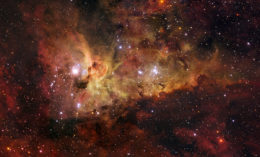 Photo of a complex stellar nebula studded with bright stars.