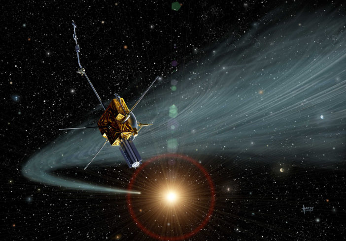 Illustration of a spacecraft flying through the tail of a comet far from the Sun.