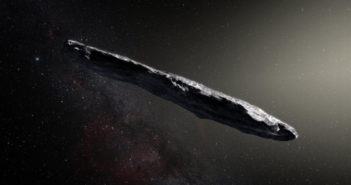 Illustration of a long, thin, rocky body in the foreground against a backdrop of the galaxy.