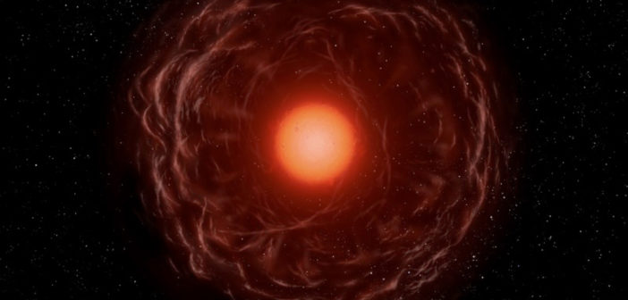 illustration of a large red star surrounded by spherical shells of mass