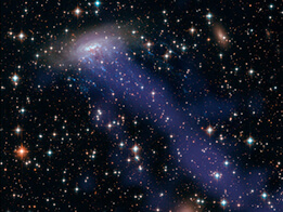 Photograph of a galaxy undergoing ram pressure stripping