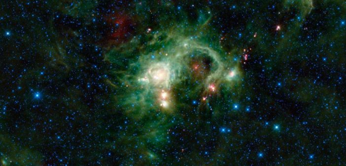 Photograph of a false-colored bright green nebula.