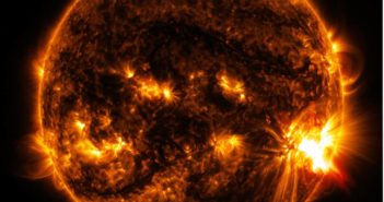 Photograph of the sun that shows a bright region on the right limb.