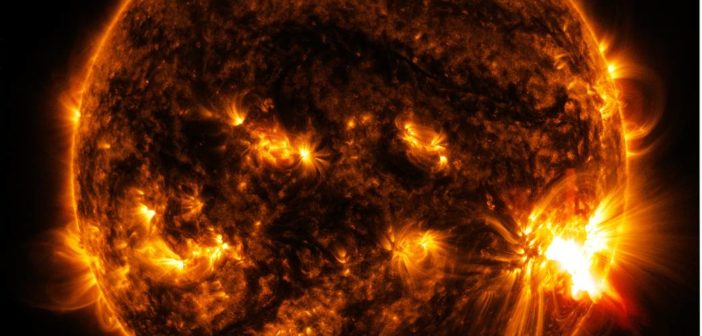 Photograph of the sun that shows a bright region on the right limb.