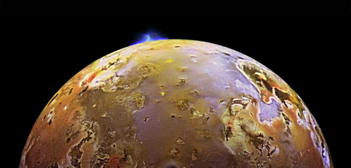 A volcanic eruption appears on the limb of Jupiter's moon Io