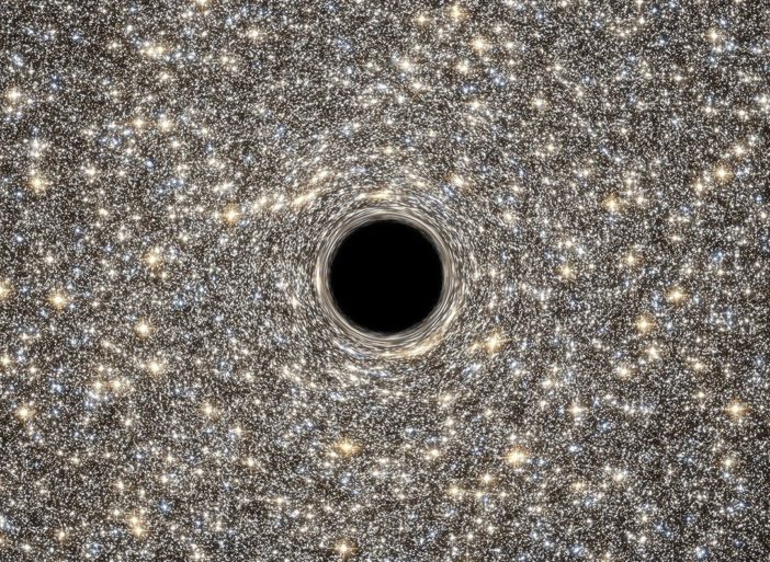 Simulated image of a black hole warping light from background stars