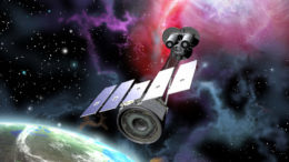 artist's rendition of the Imaging X-ray Polarimetry Explorer (IXPE) spacecraft with Earth in the background