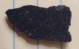 photograph of a sliced meteorite