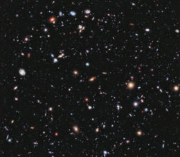 Image showing galaxies of all shapes and sizes scattered on the sky