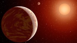 Illustration of two rocky planets orbiting an M dwarf.