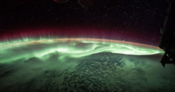 photograph of earth's aurora taken from the international space station