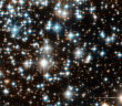 Globular star cluster featuring multiple bright stars