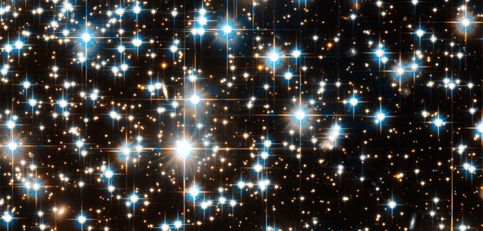 Globular star cluster featuring multiple bright stars