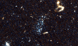 hubble image of a cluster of blue stars
