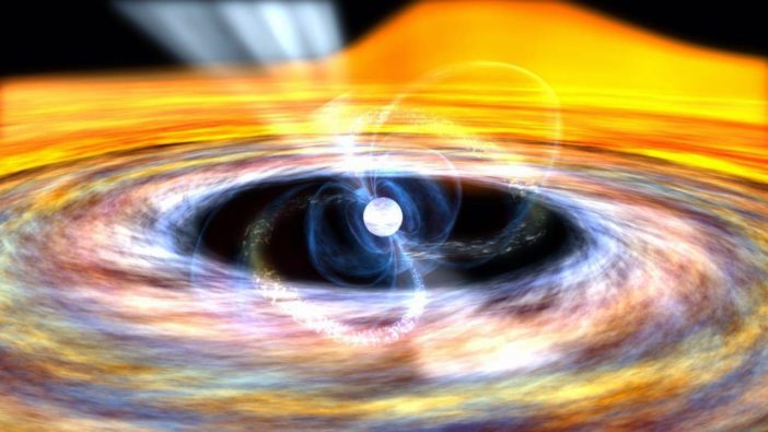 Pulsar with jets coming out of the top and bottom, magnetic field lines around it, and an accretion disk around the pulsar (with a small gap between the pulsar and the disk)
