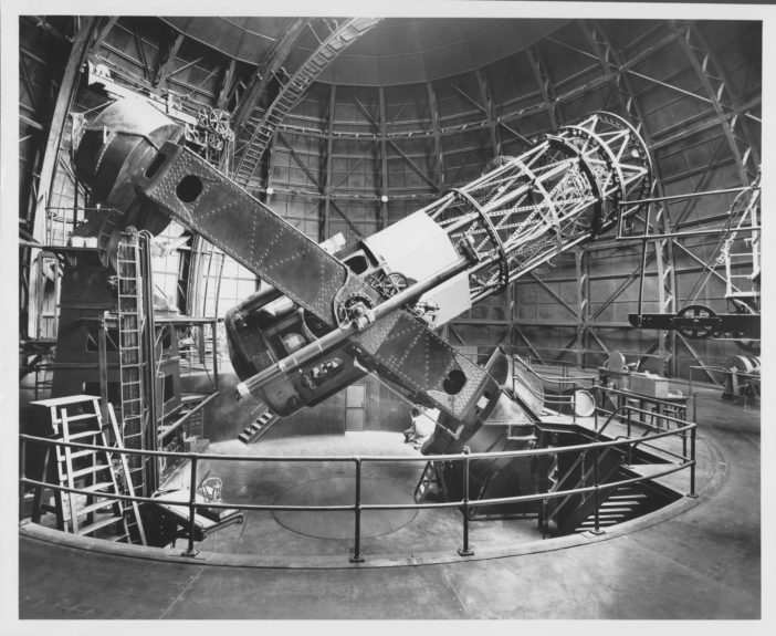 black and white photograph of a telescope