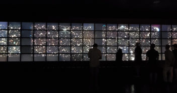 photograph of scientists examining new JWST images