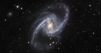 a spiral galaxy with two long, distinct spiral arms and a central bar