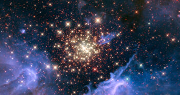 Hubble image of a star cluster surrounded by some wispy gas clouds