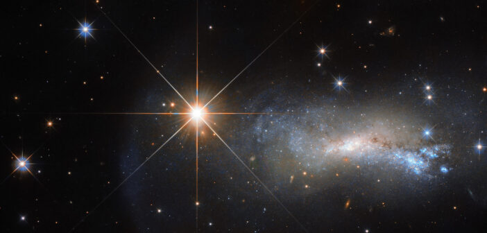 a foreground star shining in front of the galaxy NGC 7250