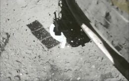 image of debris cloud created as projectiles from Hayabusa2 were shot into the surface of the asteroid Ryugu
