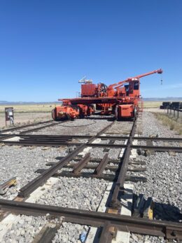 A Very Large Array antenna transporter sitting on the railroad tracks