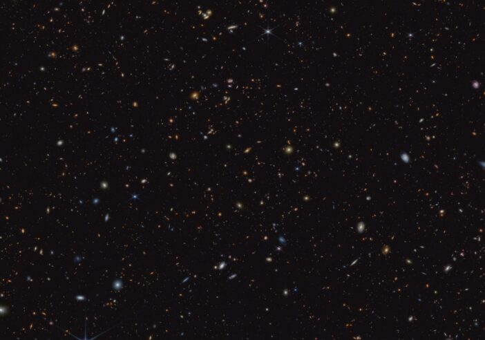 an enormous field of galaxies as seen in the infrared by JWST
