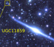 an ultra-thin galaxy seen edge on, with a potential satellite galaxy indicated off to the side