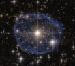 Hubble image of a star surrounded by a blue nebula