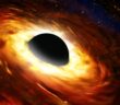 Illustration of an accretion disk swirling around a supermassive black hole