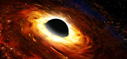 Illustration of an accretion disk swirling around a supermassive black hole