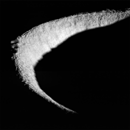 photograph of the sunlit edge of a crater on the Moon
