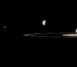 photograph of the rings of Saturn and five of Saturn's moons