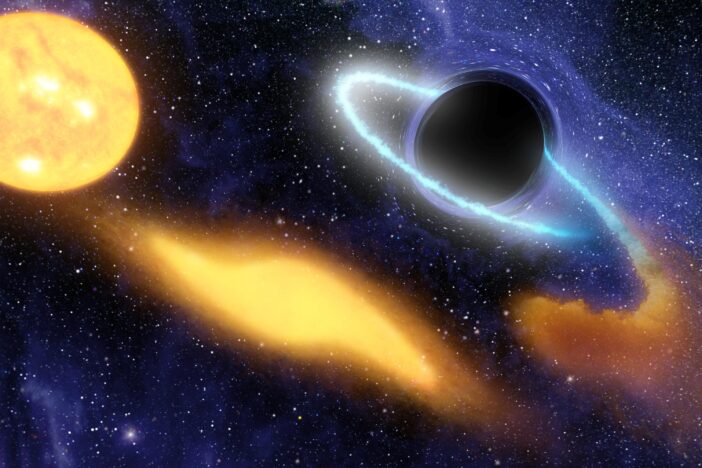 Illustration of a supermassive black hole snacking on a star
