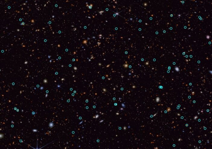 Space telescope image showing hundreds of galaxies and other stars