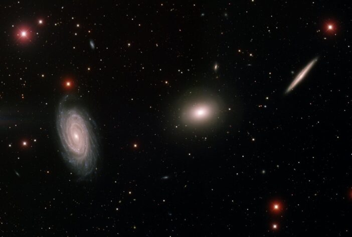 photograph of spiral and elliptical galaxies
