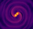 simulation snapshot showing neutron stars about to merge