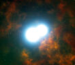 illustration of white dwarfs approaching a merger