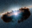 Illustration of an accreting supermassive black hole shrouded by dust