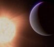 An artist's impression of a planet beside a sun-like star.