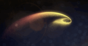 A spiral of bright material circling a black core.