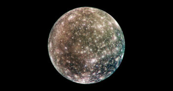 A Close Look at an Ancient Moon A photograph of a heavily cratered moon on a black background.