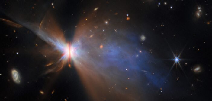 star surrounded by a protoplanetary disk and wispy outflows