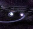 Illustration of two white dwarfs about to merge