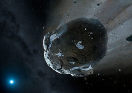 A rendering of an asteroid with large cracks and a tail of dust.
